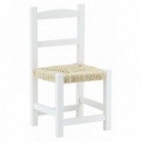 Small white wooden chair aged white with straw sitting
