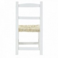 Small white wooden chair aged white with straw sitting