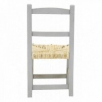 Small gray wooden chair with straw sitting