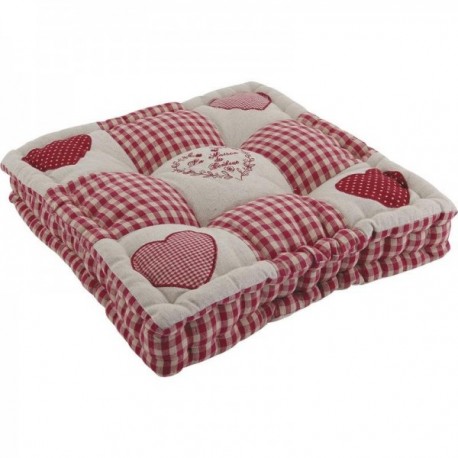 Red chair cushion with heart patterns