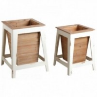 Square flowerpots on white and natural wooden legs