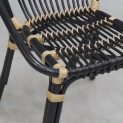 Stackable black and natural stained rattan chair