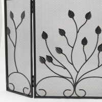 Wrought iron fireplace screen with flower decor