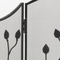 Wrought iron fireplace screen with flower decor