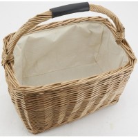 Rectangular buff brown wicker basket lined with cotton