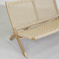 Folding bench made of teak wood sitting and back in synthetic rattan