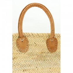 Top tas in palm met dikke handvatten in geolied leer